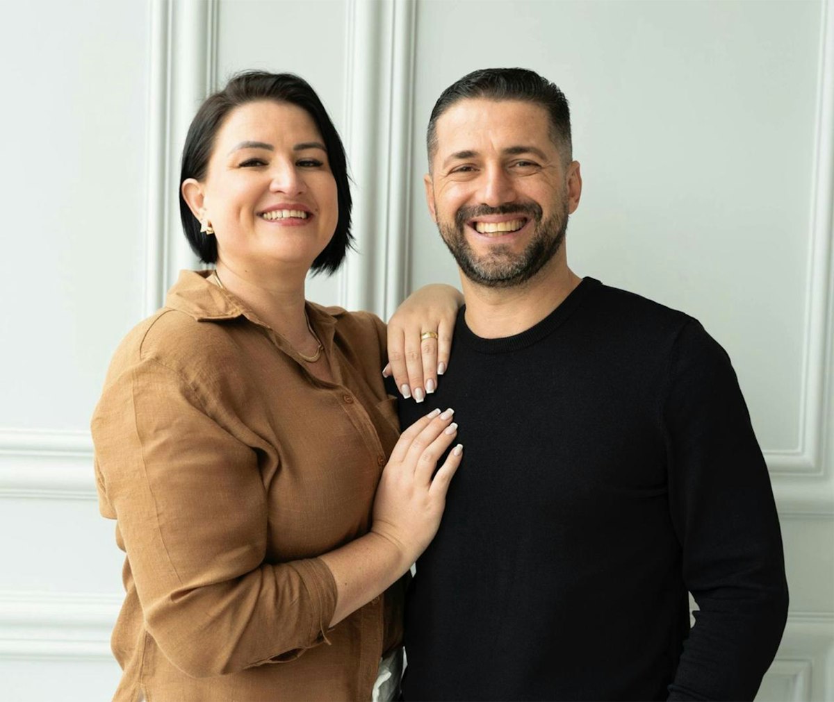 Mexican couple reviewing financial information
